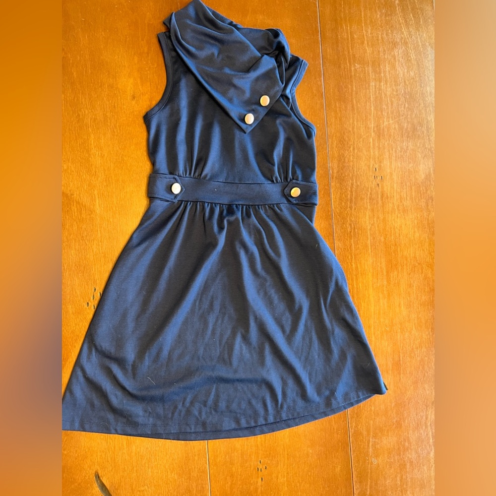 Adorable monteau jersey sleeveless fit and flare dress with pockets.